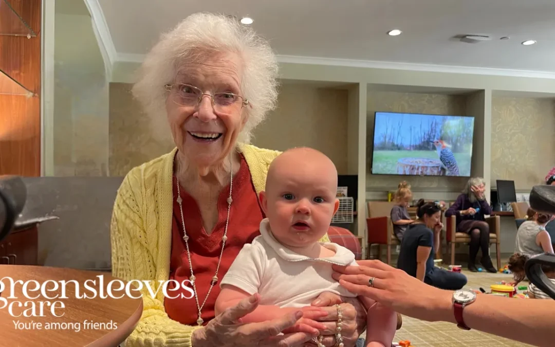 Resident holding a baby