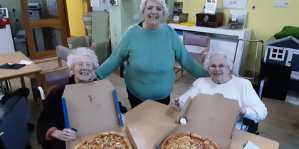 Harleston House receives delicious donation for National Pizza Day