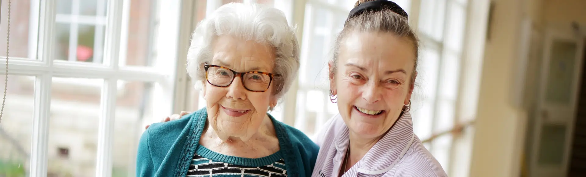 Photo of an elderly resident and carer